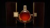 Pride 1981. Design of a whisky decanter for Glenmorangie.<br />To pay a tribute to time passing by...I wanted to illustrate this contrast between darkness and revelation when the elixir is released : its birth. The decanter shows this exceptional expansion, maturity and  the generosity of its birth to light.<br />I was inspirated by the barrel which protected this lasting unbreakable intimacy with a Premier Cru  Superieur of Chateau D'Yquem and a rare vintage whisky.<br />The bottle is numbered and signed, from 1 to 1000 ex. It has been blown by Baccarat<br /><br /><a href='http://www.glenmorangie.com/experience-perfection/pride-story'>Glenmorangie website</a><br /> - Laurence Brabant Alain Villechange