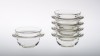 Disko. Mechanical glass dishes. Three sizes, all stackable. <br />Dimensions : Heights 67mm, 83mm, 103mm.<br />Design : Laurence Brabant, 2009.<br /><br />Photographic credit : Xavier Nicostrate.<br /> <br /> - Laurence Brabant Alain Villechange