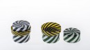 SIGNALS. Simple and nested boxes. Decors either in green/white or black/white with yellow/black lids. <br />Signed pieces. Collection 2016.<br /><br />S1 : diameter 50, height 50mm.<br />S2 : diameter 70, height 70mm.<br />S3 : diameter 95, height 90mm.<br />S4 : diameter 95, height 125mm.<br /><br />Photographic credit : Xavier Nicostrate. - Laurence Brabant Alain Villechange