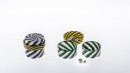 SIGNALS. Simple and nested boxes. Decors either in green/white or black/white with yellow/black lids. <br />Signed pieces. Collection 2016.<br /><br />S1 : diameter 50, height 50mm.<br />S2 : diameter 70, height 70mm.<br />S3 : diameter 95, height 90mm.<br />S4 : diameter 95, height 125mm.<br /><br />Photographic credit : Xavier Nicostrate. - Laurence Brabant Alain Villechange