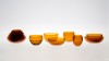 Set of seven small bowls in amber glass. <br />Signed, numbered edition from 1 to 50 ex. +1A.<br />Dimensions : diameter 130mm, total heigh 80mm.<br /><br />Photographic credit : Xavier Nicostrate. - Laurence Brabant Alain Villechange