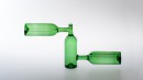 Equilibre, vert 3, 2009. Composition of three bottles that are stable only with water inside. Bottles are blown and then fused together.<br />Height 300mm, width 650mm and diameter 70mm.<br />Design and making : Alain Villechange. 2009. Purchase of the Museum and Art Center of Carmaux in 2019.<br /><br />Photographic credit : Xavier Nicostrate. - Laurence Brabant Alain Villechange