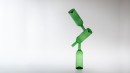 Equilibre, vert 2, 2009. Composition of three bottles that are stable only with water inside. Bottles are blown and then fused together.<br />Design and making : Alain Villechange. 2009.<br />Height 700mm, width 220mm and diameter 70mm.<br /><br />Photographic credit : Xavier Nicostrate. - Laurence Brabant Alain Villechange
