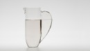 EXPANSIF. Pitcher with an hollow and handle. The handle contains less liquid thus it appears clearer.<br />Dimensions : height 320mm. <br /><br />Photographic credit : Xavier Nicostrate. - Laurence Brabant Alain Villechange