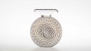 ROSETTE is a smart decanter but suitable for the internal door of a fridge. It offers a very convenient gripping.<br />Dimensions : diameter : 150mm, height 185mm, width 95mm. Capacity is 1,1liter. <br /><br />Photographic credit : Xavier Nicostrate. - Laurence Brabant Alain Villechange